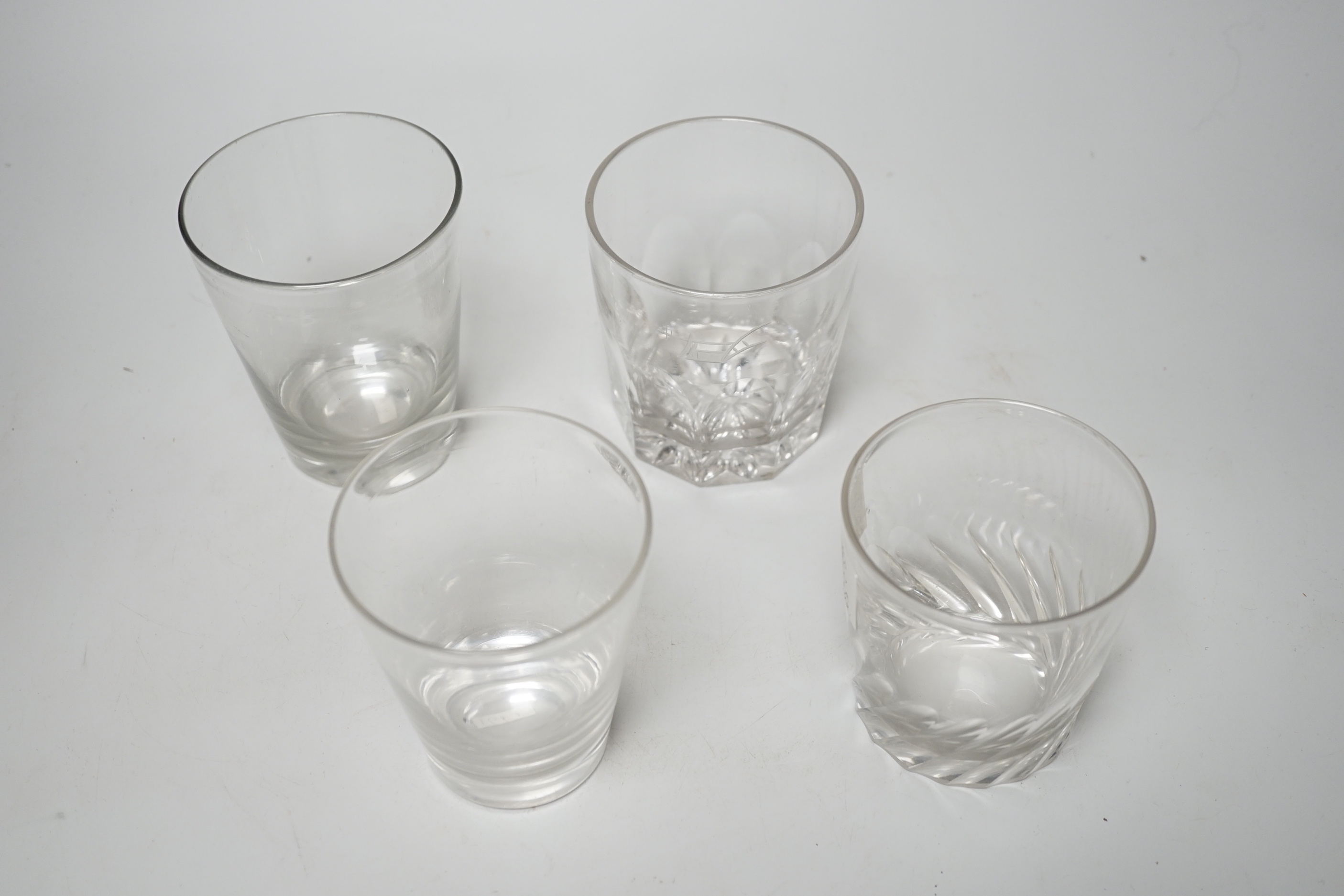 Four Georgian English lead crystal tumblers, one earlier example c.1770, with rare, wide, ground and polished pontil area, 11.5cm high